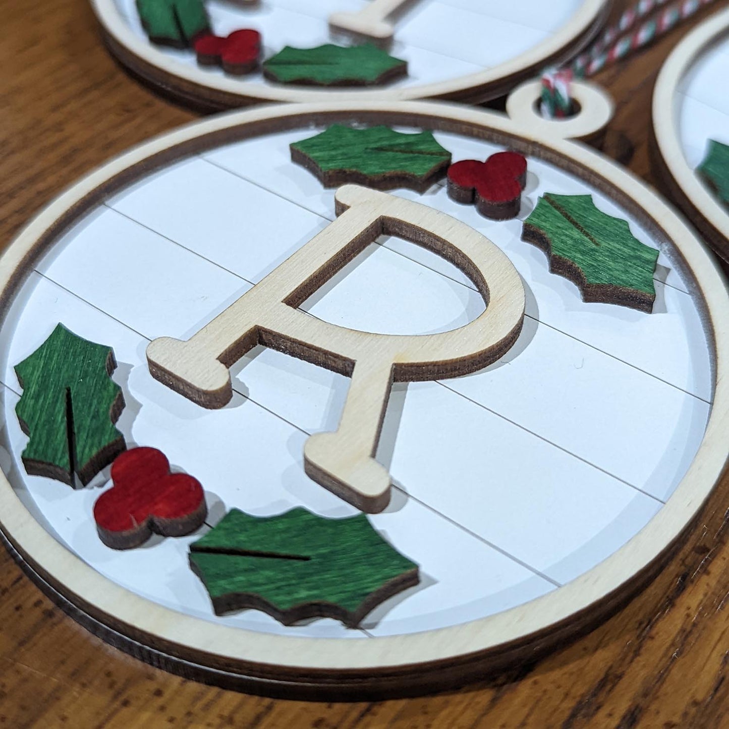 Port_WoodOrnamentInitial