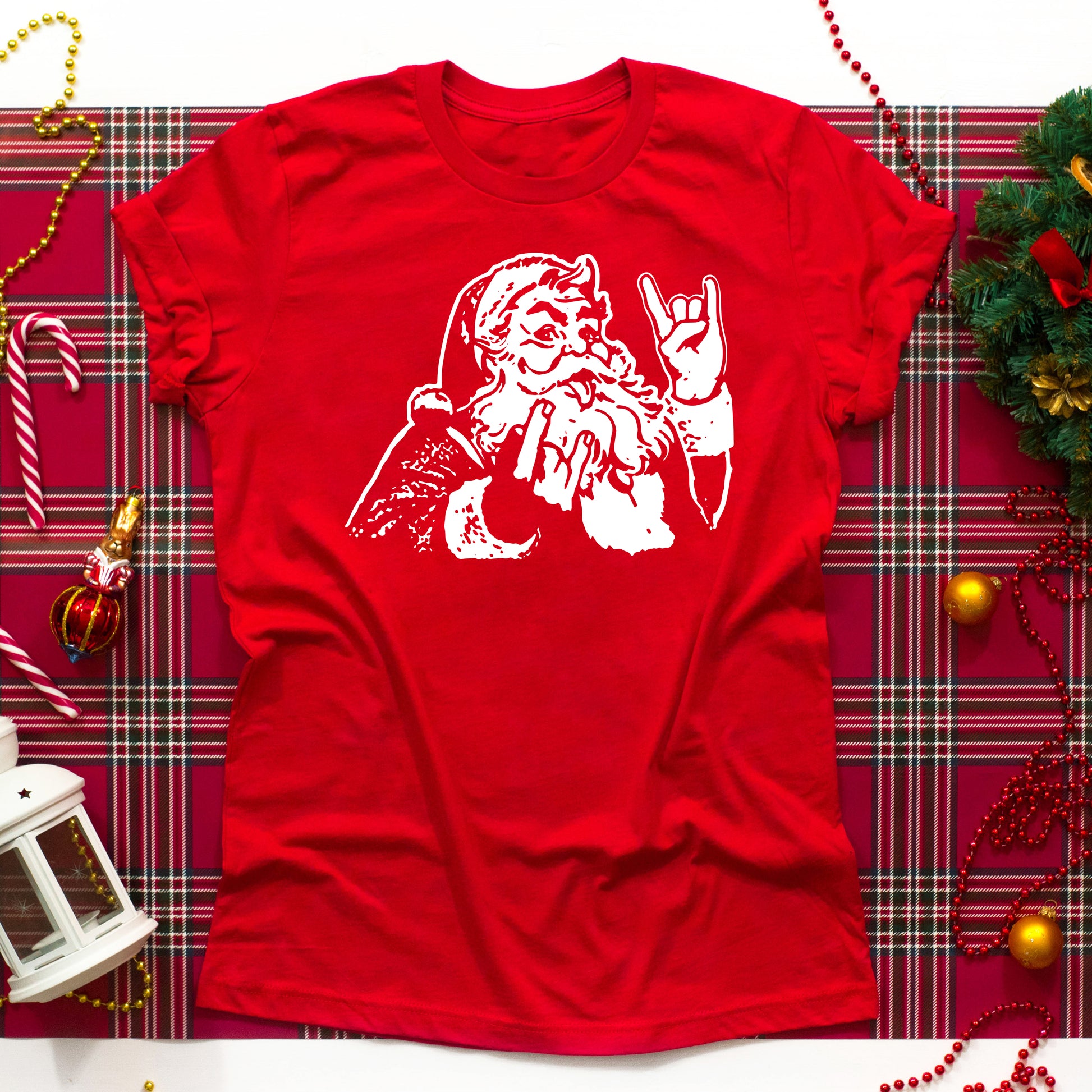 Rocker Santa Shirt by Scorched Thorn – Hail Santa heavy metal Christmas shirt with graphic Santa throwing the horns